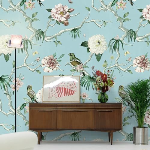 Vintage blue floral and bird wallpaper in a living room